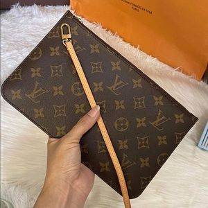 Louis Vuitton neverfull wristlet MM.